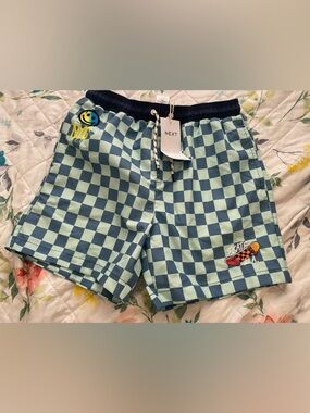 next Checkerboard Swim Shorts in Light Blue and Navy with Patches
